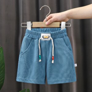 Nowe letnie spodenki chłopięce spodenki plażowe w cukierkowym kolorze dla dzieci na co dzień w pasie krótkie spodnie dziecięce odzież sportowa znosić - AliExpress 1501