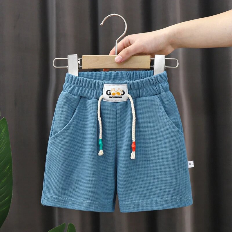 Nowe letnie spodenki chłopięce spodenki plażowe w cukierkowym kolorze dla dzieci na co dzień w pasie krótkie spodnie dziecięce odzież sportowa znosić - AliExpress 1501
